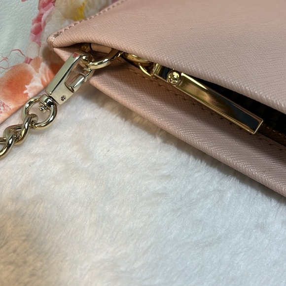 Kate Spade Bag gold name on outside of bag, pink leather, gray and white lining - Picture 8 of 9